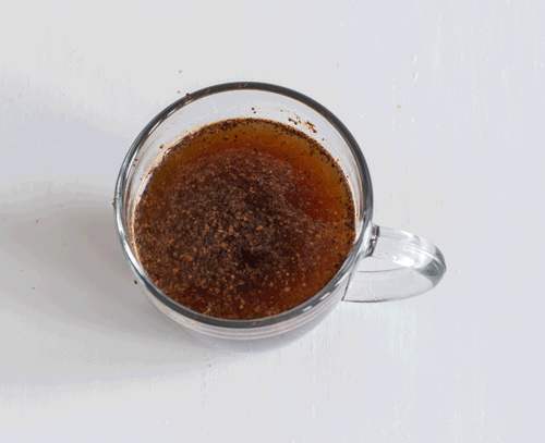 Gif showing unfiltered Turkish coffee being drunk from a glass cup