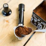 filling a portafilter with coffee