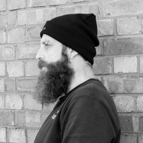 wearing a two chimps coffee beanie hat