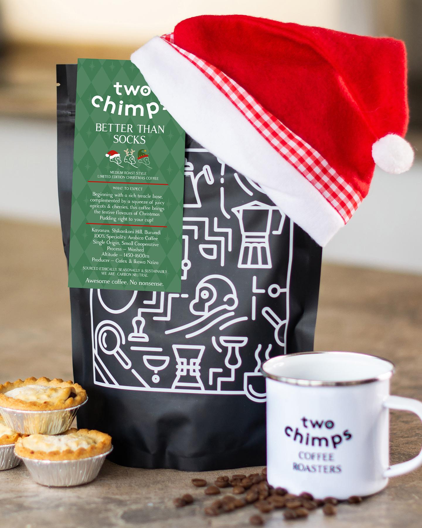 Bag of Christmas Coffee wearing a Santa Hat