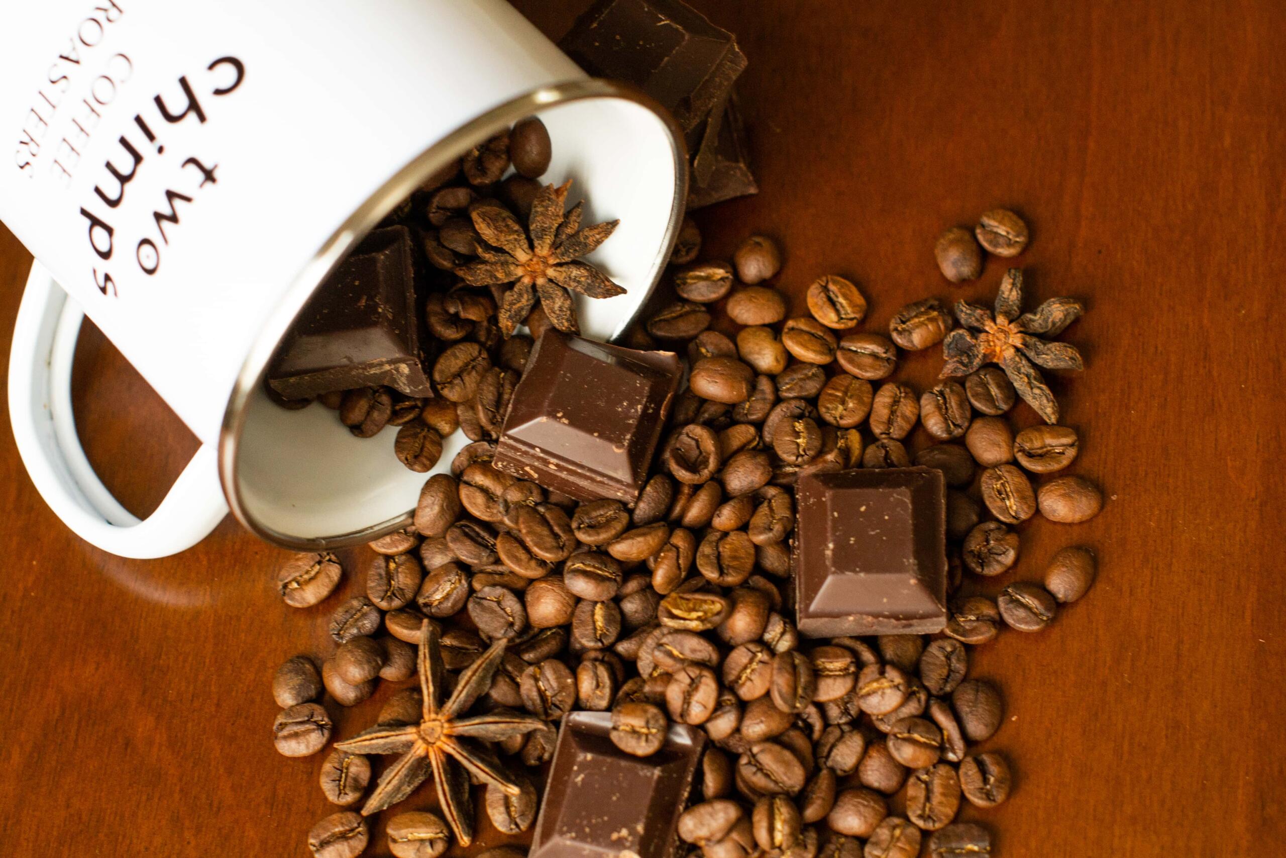 Cup full of coffee beans and spices