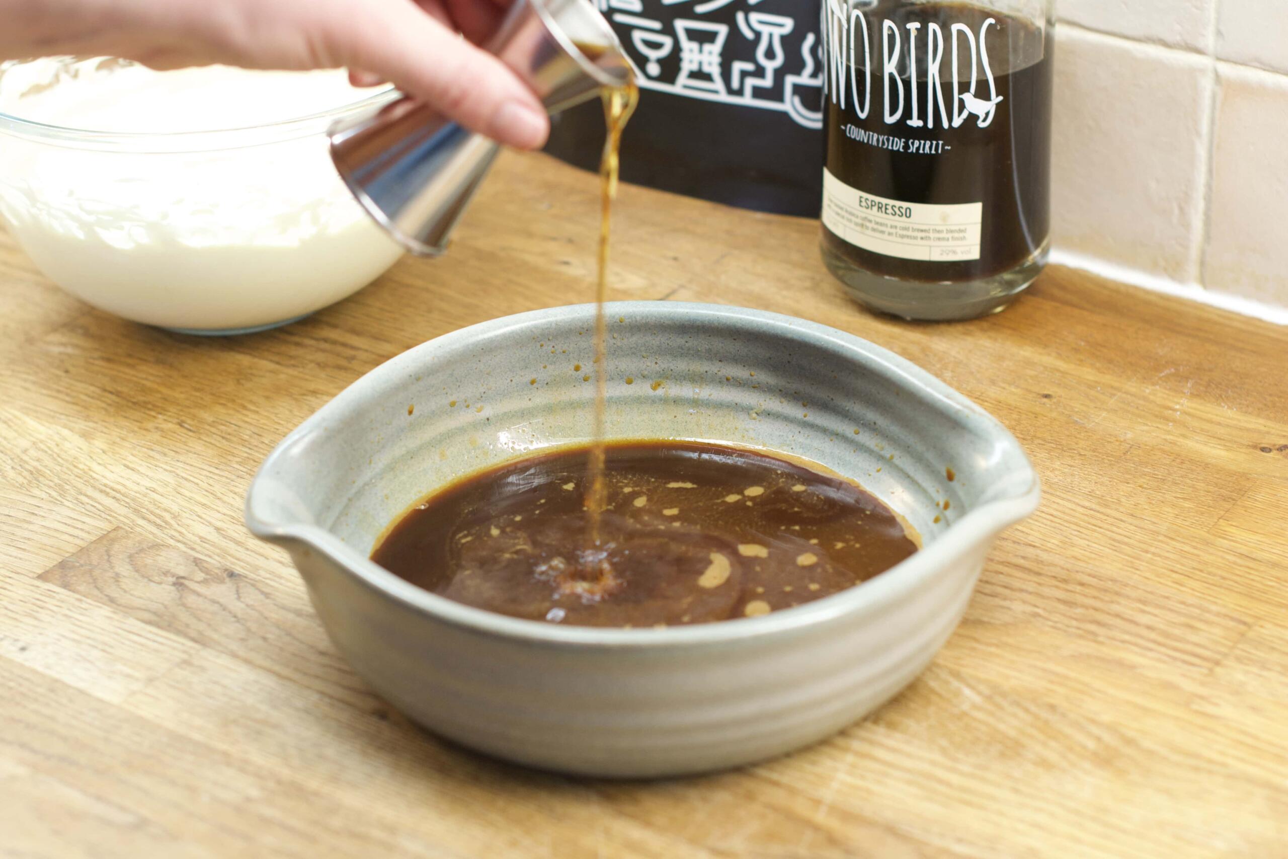 Pouring in the Espresso Vodka