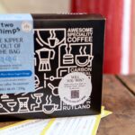 Two Chimps The Kipper Is Out Of The Bag Coffee Box with a Golden Ticket Sticker announcing the competition