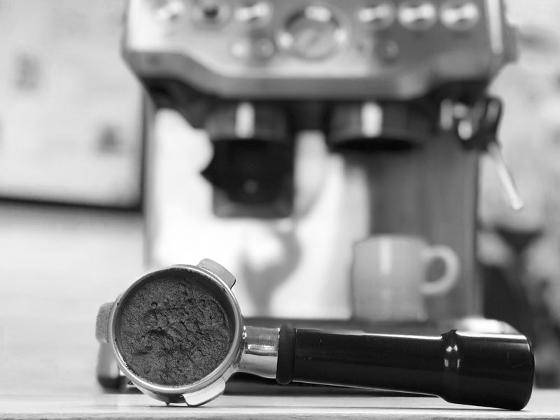 portafilter in front of a sage espresso machine