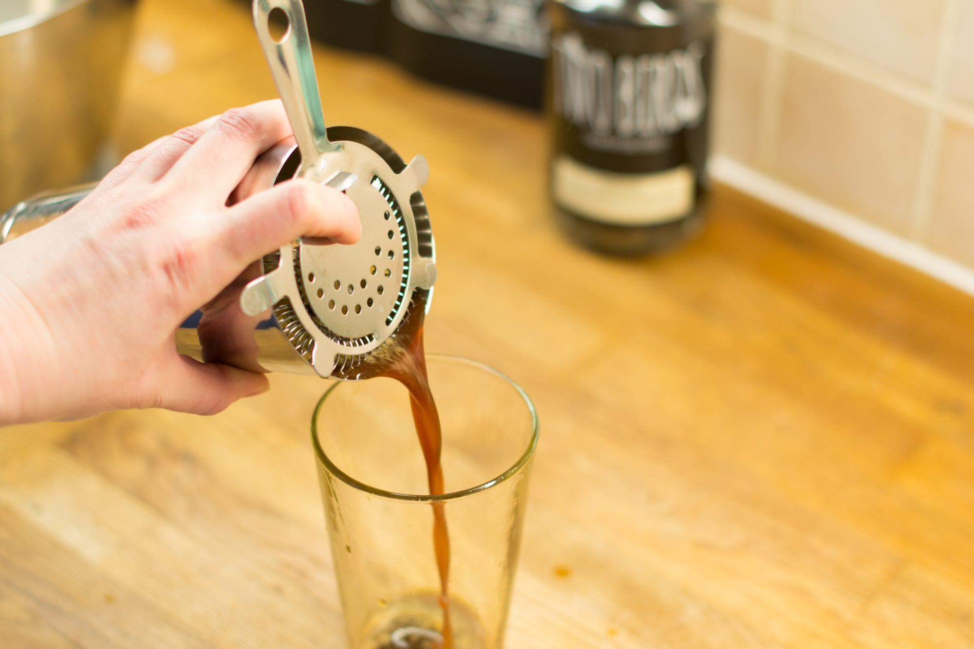 Strain the cocktail into glass