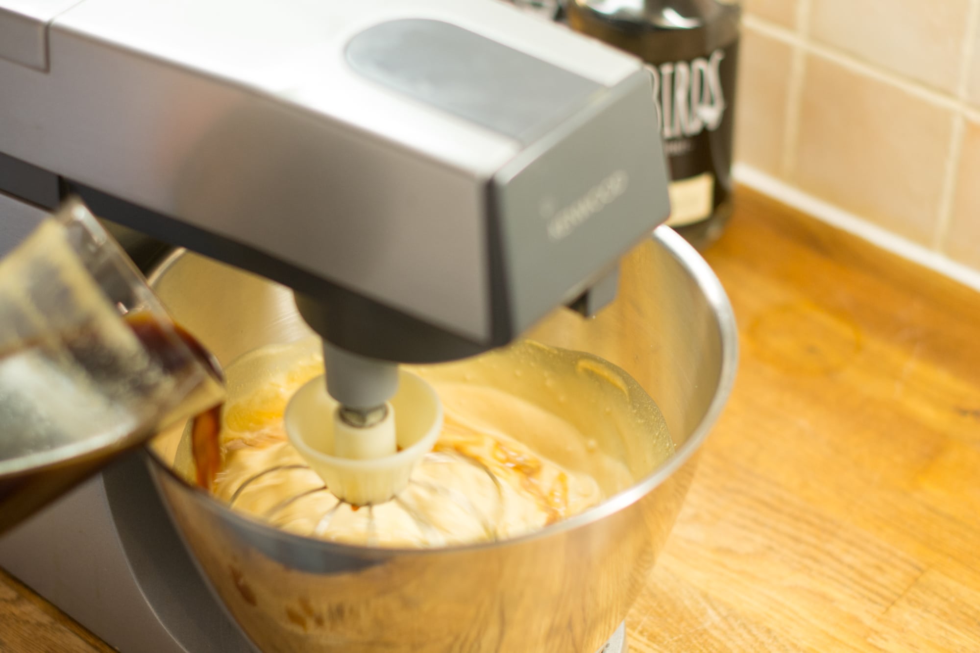 Pouring the espresso martini cocktail into cream