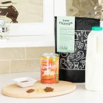 Pumpkin spiced coffee ingredients on kitchen counter