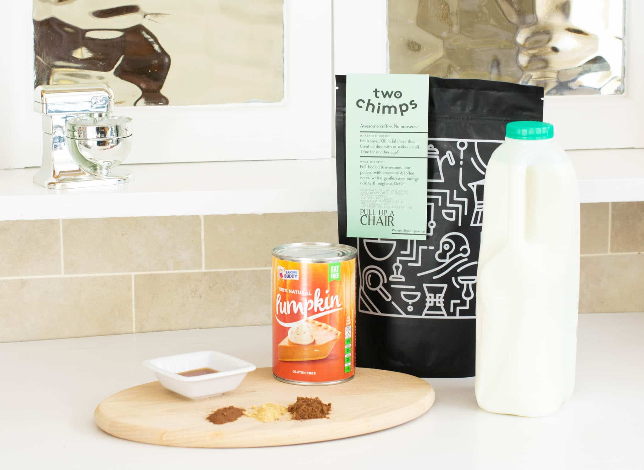 Pumpkin spiced coffee ingredients on kitchen counter