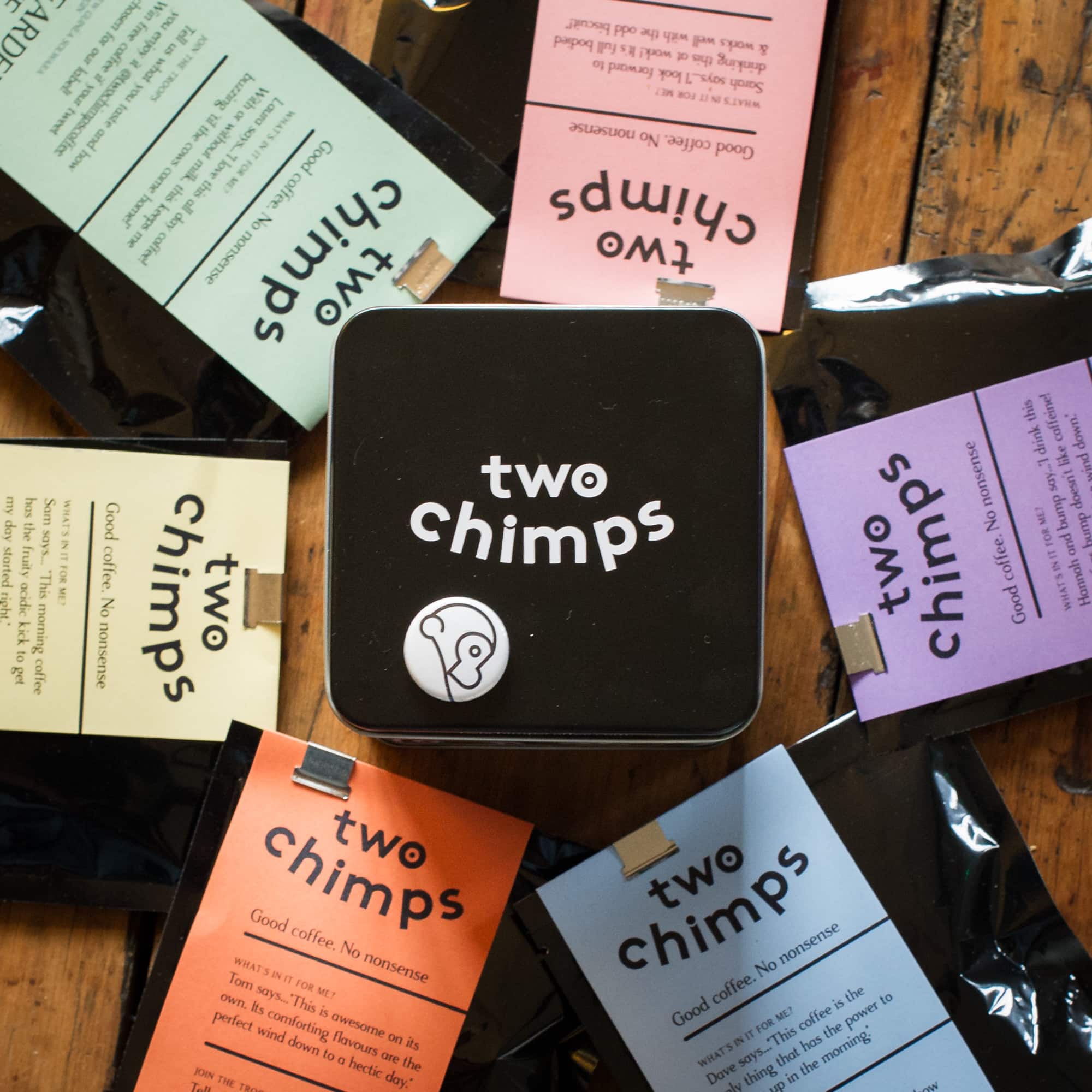 six coffee bags and tin