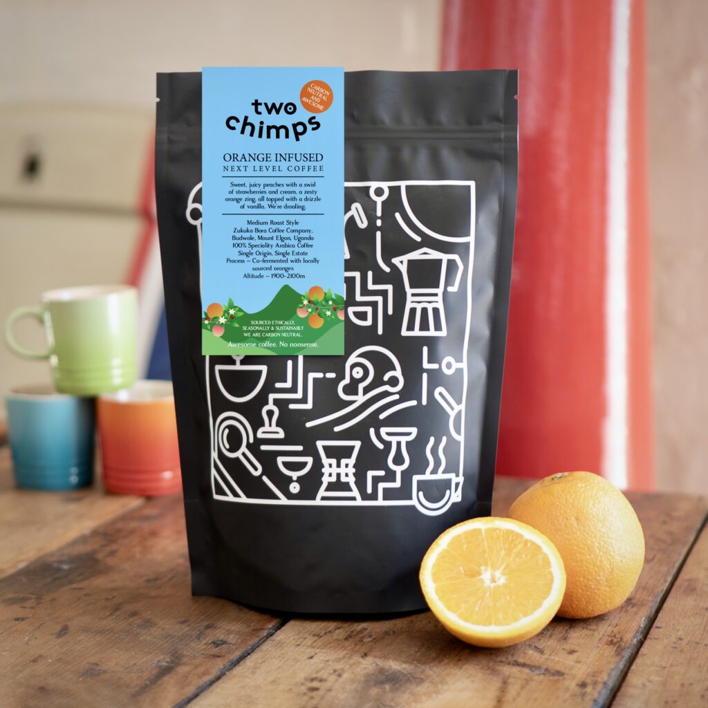 Bag of orange infused coffee on table