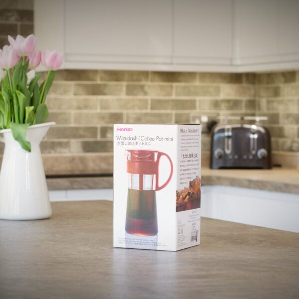 boxed red hario mizudashi cold brew coffee pot on kitchen worktop