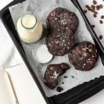 cookies on baking tray with notebook