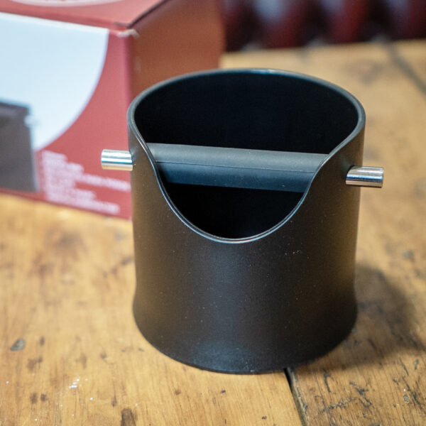 Close up of knock box on table