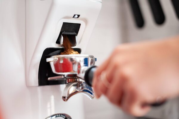 coffee grinding into portafilter