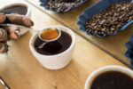a spoon full of coffee for cupping