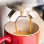 Espresso coming out of machine