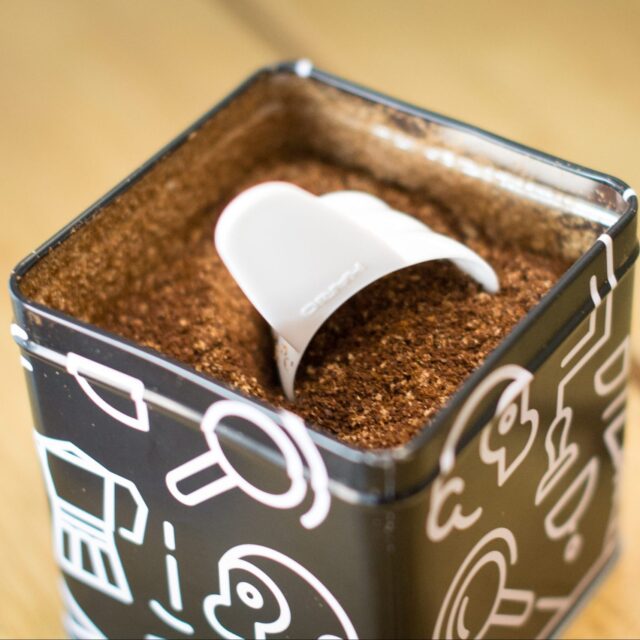 scoop in a tin full of coffee