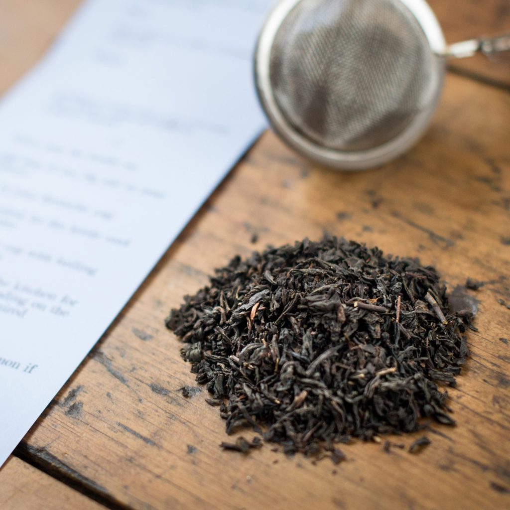 earl grey loose leaf tea from two chimps with label and tea infuser