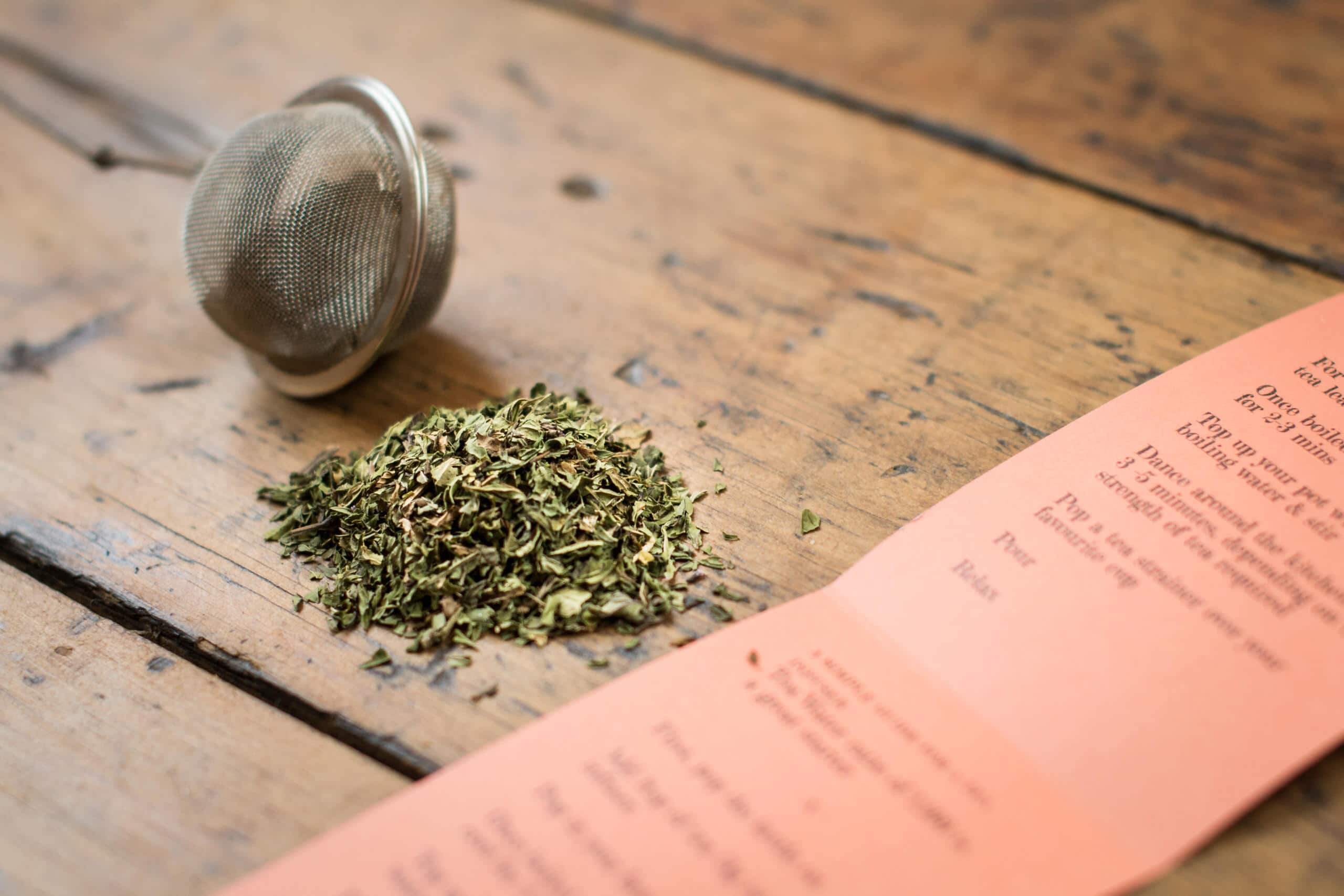 loose leaf peppermint tea with label and infuser 