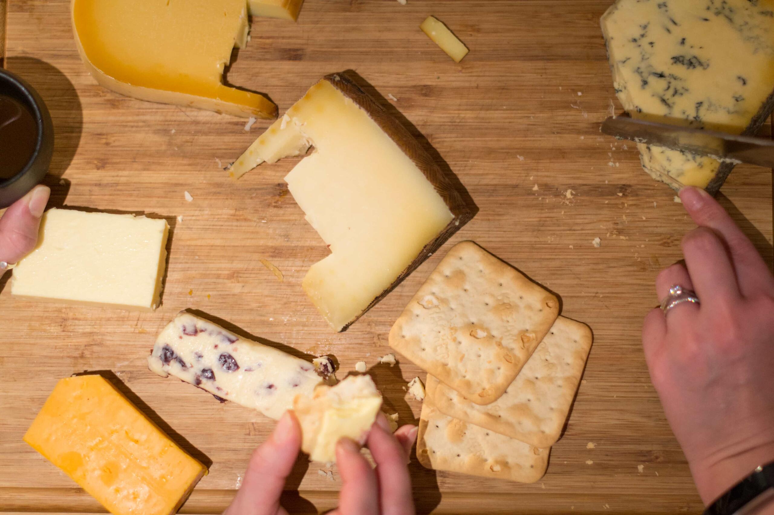 eating cheese on a cheese board