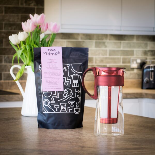hario red mizudashi cold brew mini pot with a bag of two chimps coffee on a kitchen worktop
