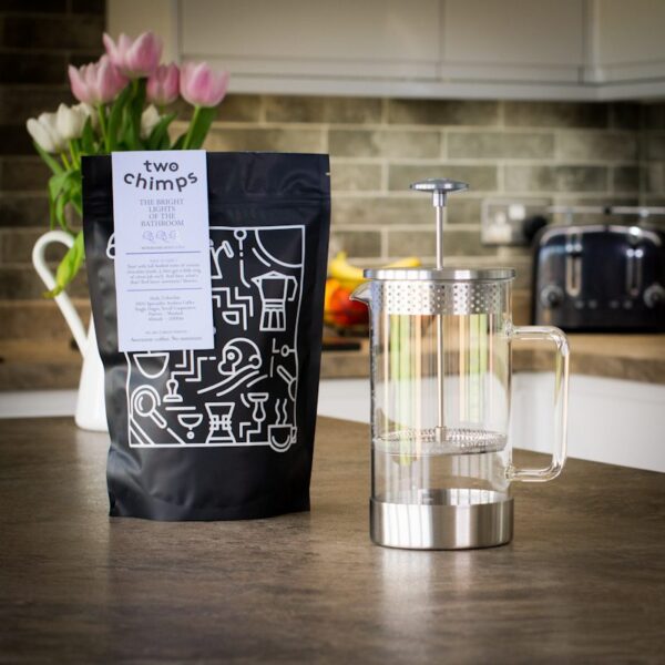 unboxed cafetiere with bag of two chimps coffee on kitchen worktop