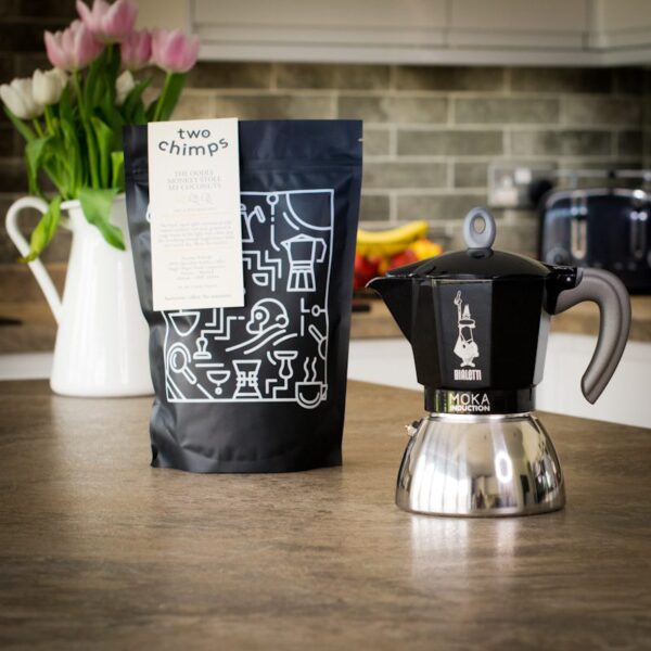 bialetti moka induction pot with bag of two chimps coffee on a kitchen worktop