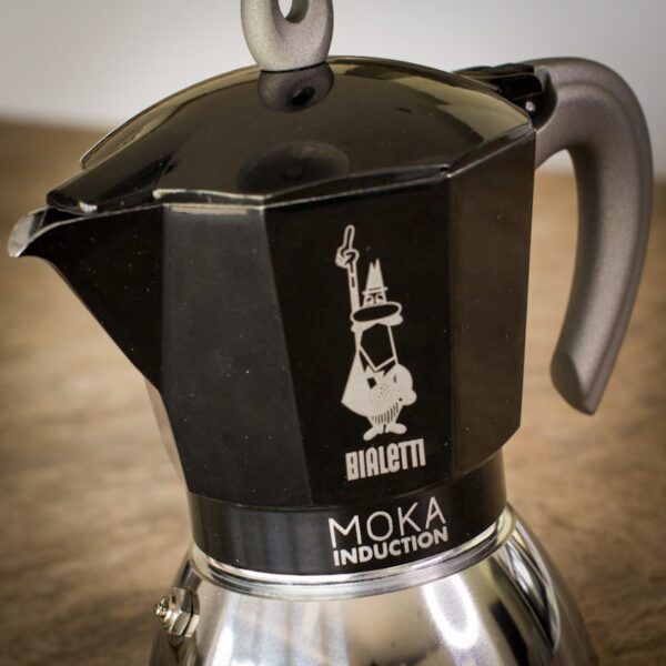 close up of bialetti moka induction pot on kitchen worktop