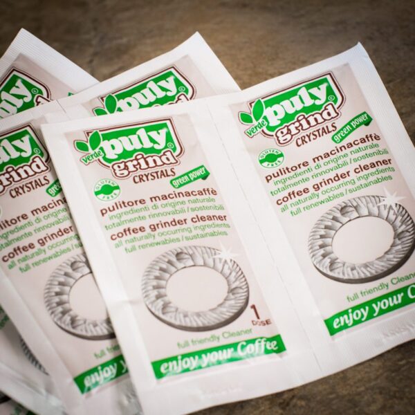 close up of unboxed puly coffee grinder cleaning crystals