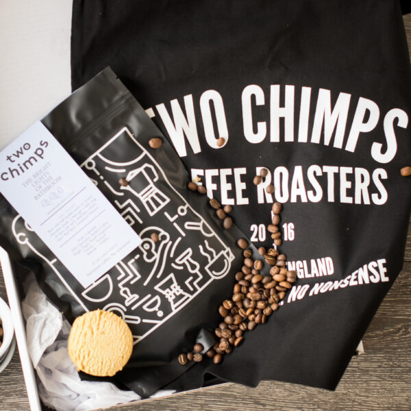two chimps coffee tote bag and bag of coffee on kitchen worktop