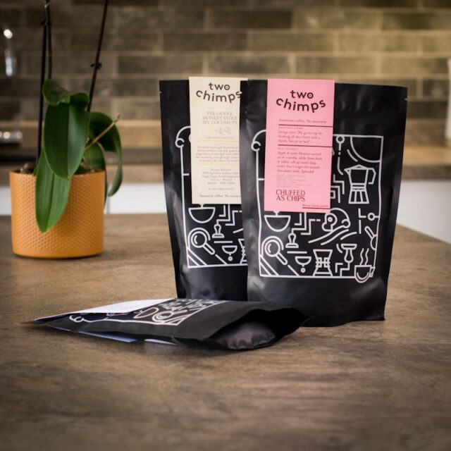 three bags of two chimps coffee on a kitchen worktop