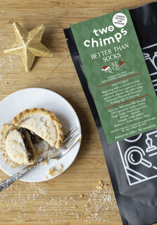 Photo of Christmas coffee next to mince pie